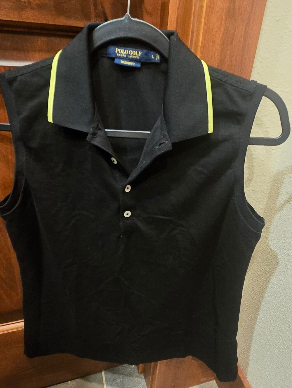 Ralph Lauren Polo Golf black sleeveless shirt top. Yellow trim. Size Large. EUC!